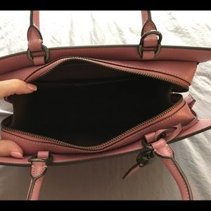 Coach Handbag with matching wallet.